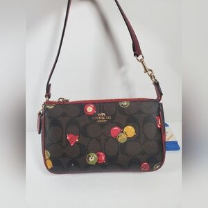 Coach Nolita 19 In Signature Canvas wristlet With Ornament Print